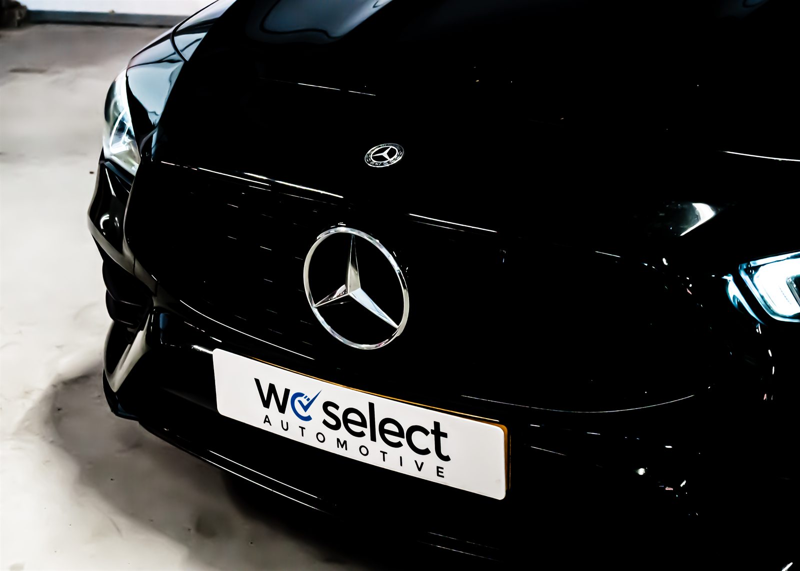 Mercedes-ster met We Select-kenteken